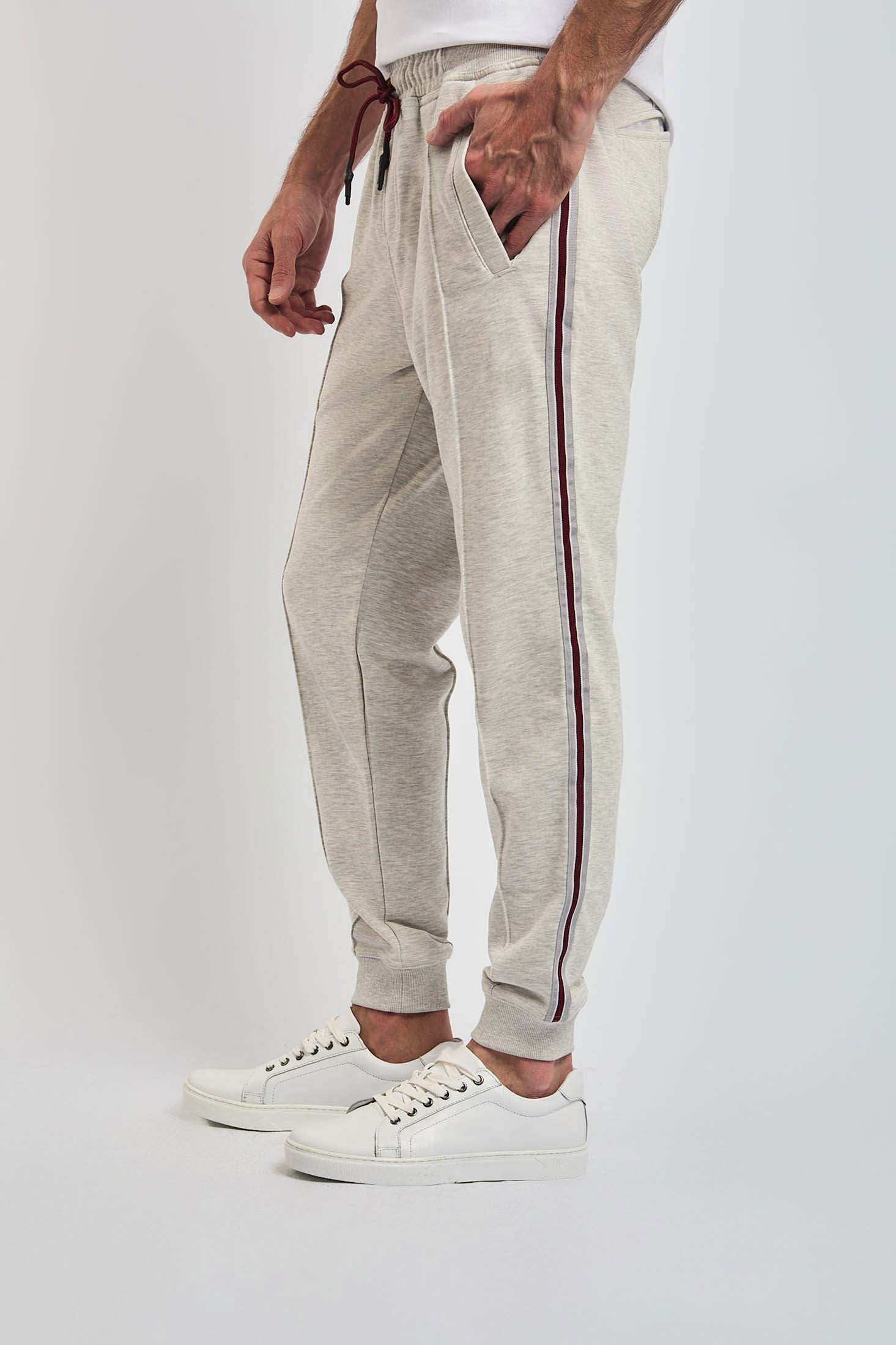 Dalydress men's casual grey sweatpants with side stripes and drawstring, styled with white sneakers