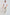 Dalydress men's casual wear, model in white t-shirt, beige pants, white sneakers