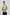 Man wearing light green short sleeve crew neck t-shirt and black pants
