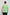 Man wearing light green short sleeve t-shirt, viewed from the back, on plain background