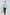 Man wearing a light blue mandarin collar shirt and dark trousers, casual fashion look