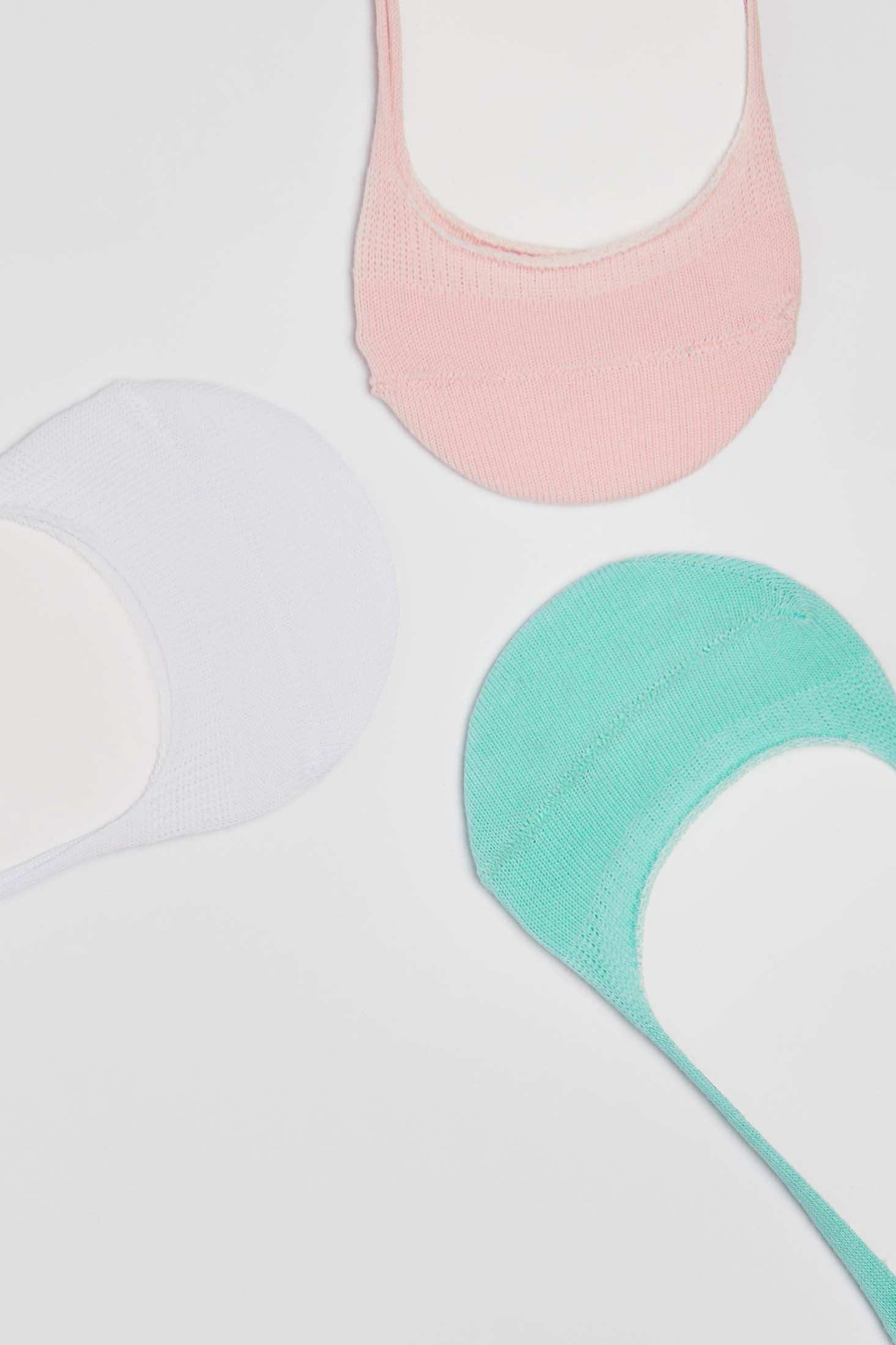Set of pastel no-show socks in pink, white, and mint green on white background