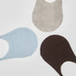 Three pairs of no-show socks in beige, light blue, and brown on a white background