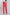 Woman in coral pink high-waisted pants with back pockets and white blouse, back view