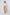 Woman in white button-up shirt and tan wide-leg pants with beige heels, casual chic outfit