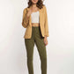Woman wearing beige blazer, white crop top, olive green pants, and woven loafers