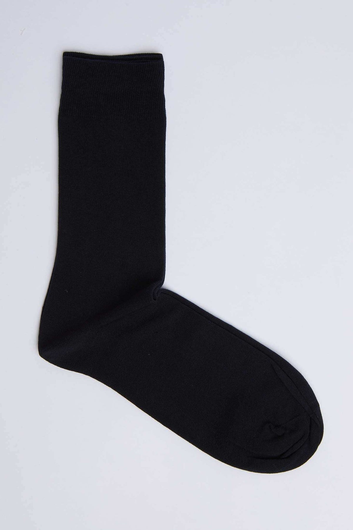 Plain black crew sock on white background, men's and women's fashion accessory
