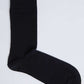 Black cotton crew sock on white background, casual men's or women's clothing accessory