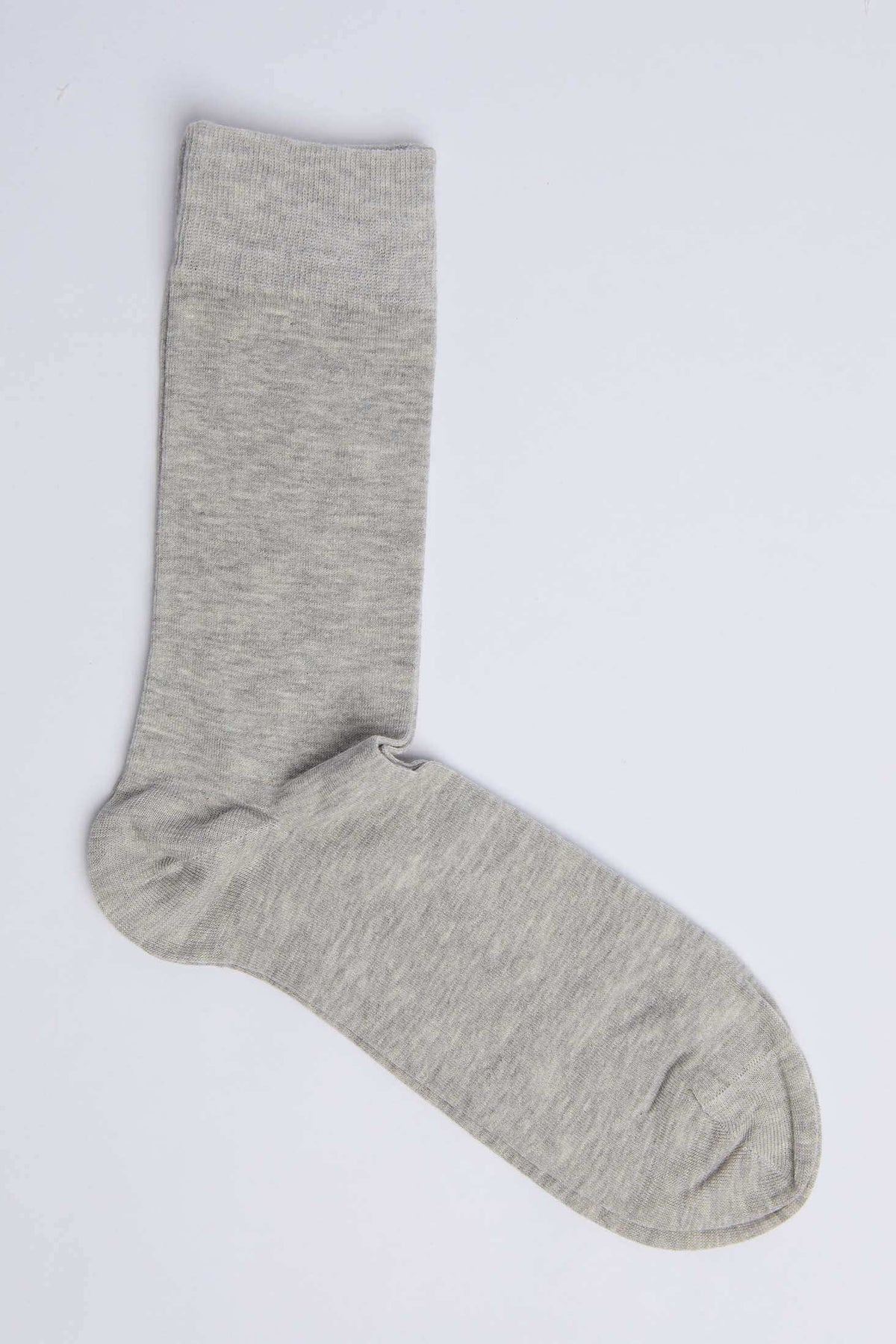 Plain light grey crew sock on white background, casual cotton blend men's accessory