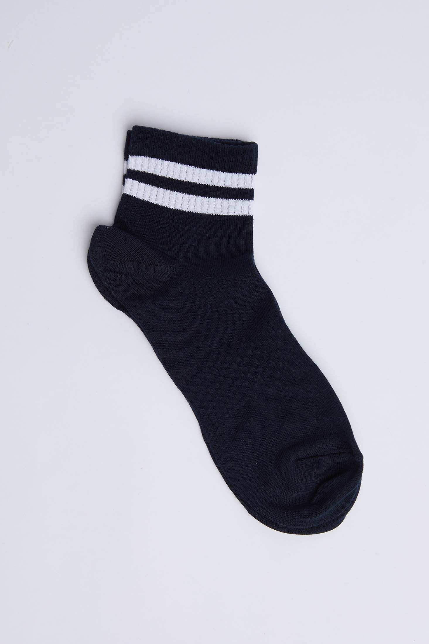 Black ankle sock with white double stripes on ribbed cuff, casual style on white background