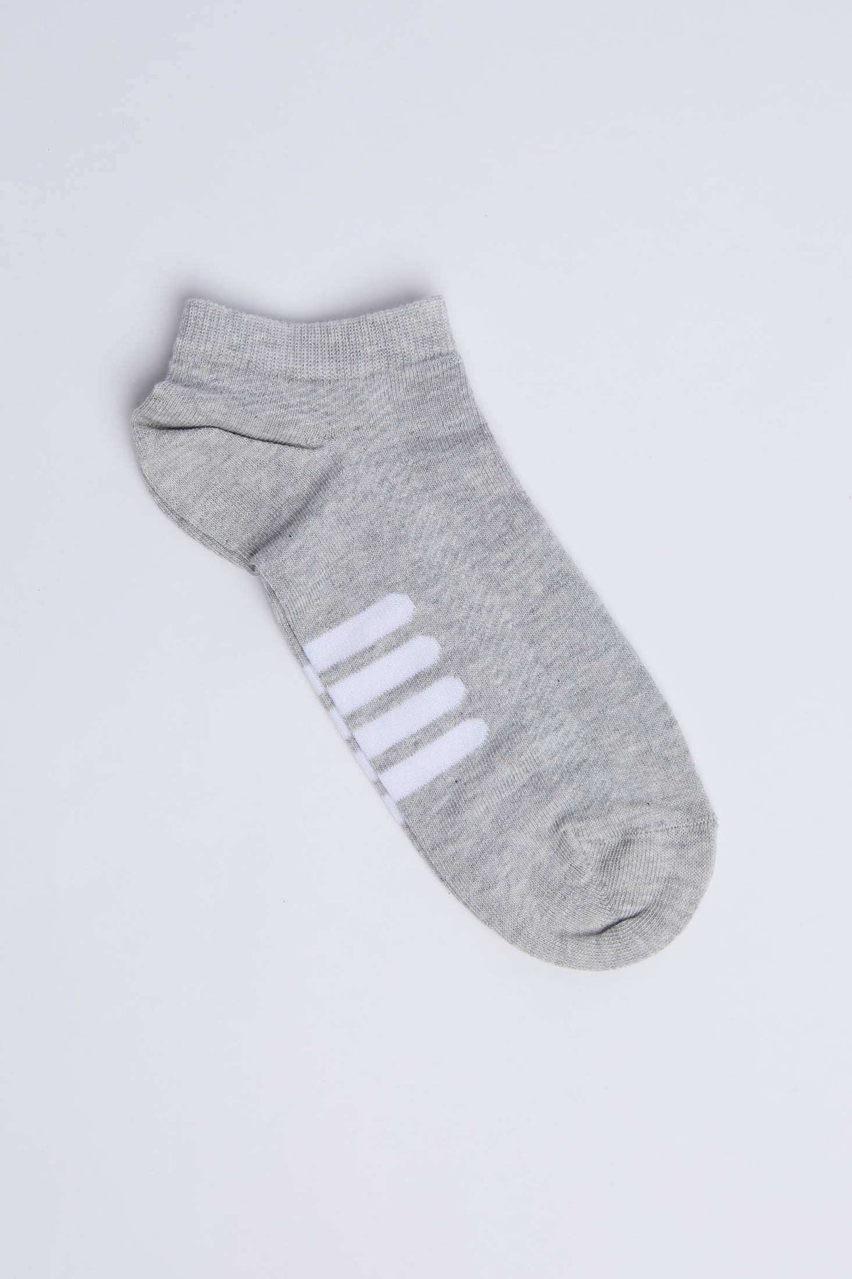 Gray ankle sock with white stripe accents on plain background