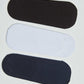 Set of three no-show socks in black, white, and navy colors on a plain background