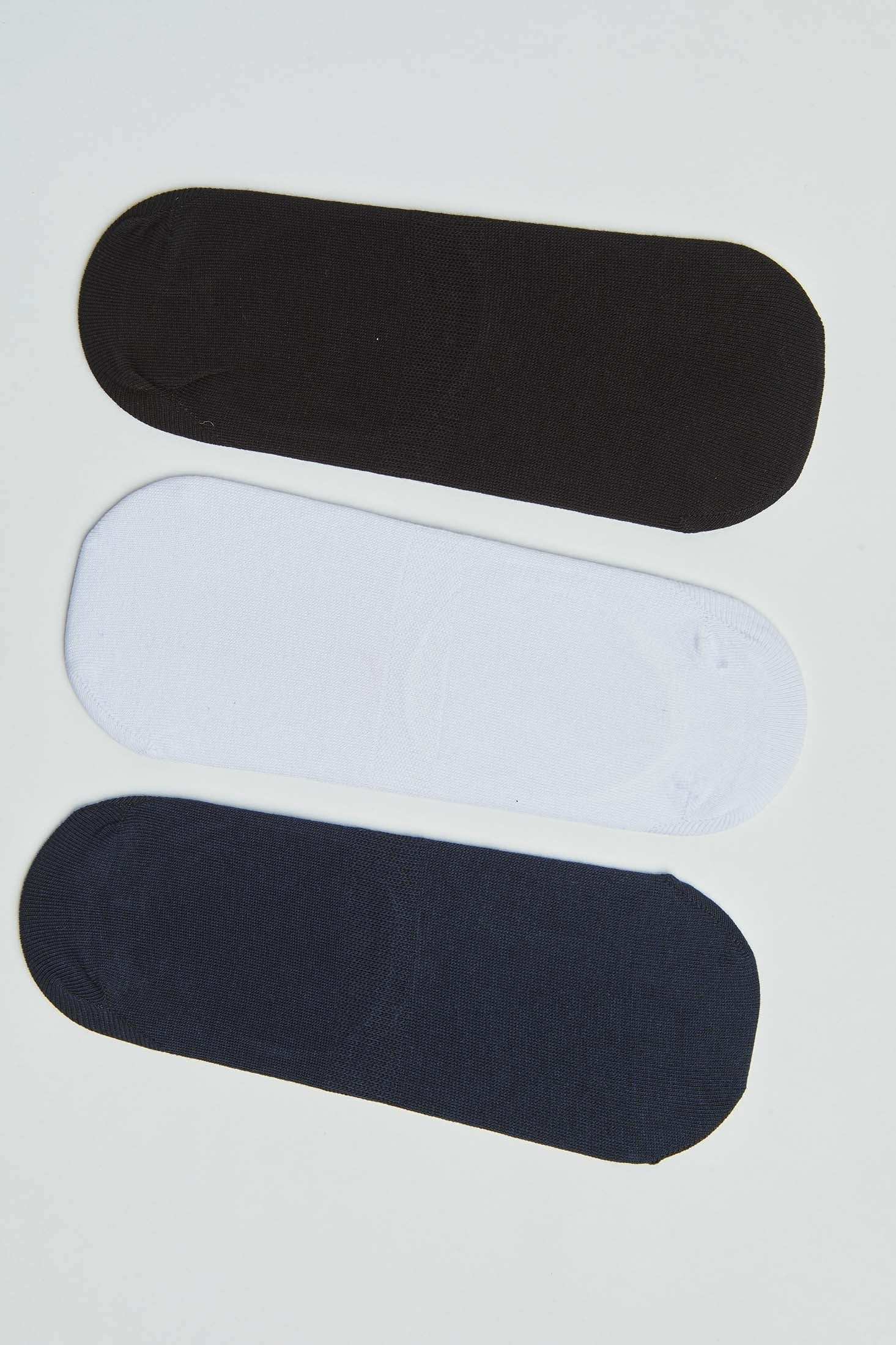 Set of three no-show socks in black, white, and navy colors on a plain background