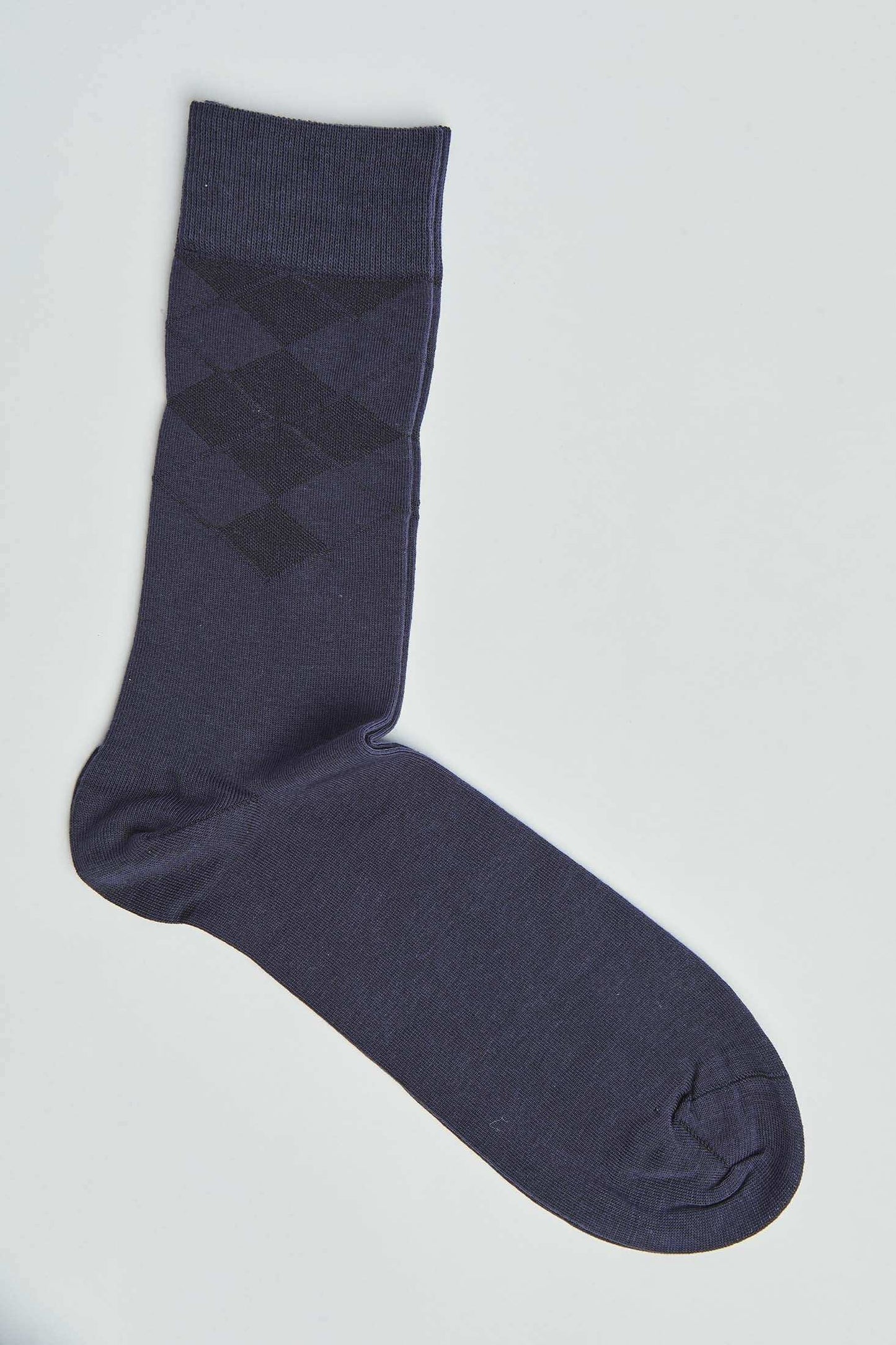 Navy blue sock with subtle diamond pattern, men's fashion accessory on white background