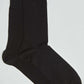 Pair of plain black crew socks on a white background, men's casual accessories