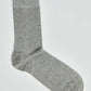 Plain grey men's sock on white background, casual cotton hosiery product photo