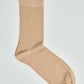 Beige crew sock for men, plain cotton blend, isolated on white background