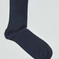 Plain navy blue ribbed crew sock on a white background