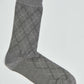 Gray dress sock with subtle diamond pattern, suitable for men's formal or business wear