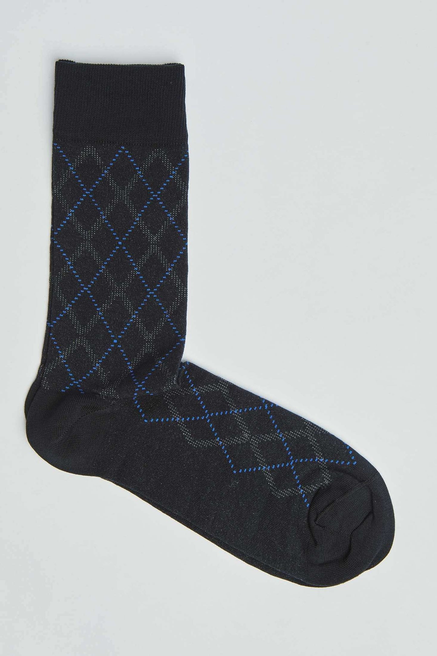 Black dress sock with blue and gray argyle pattern on white background