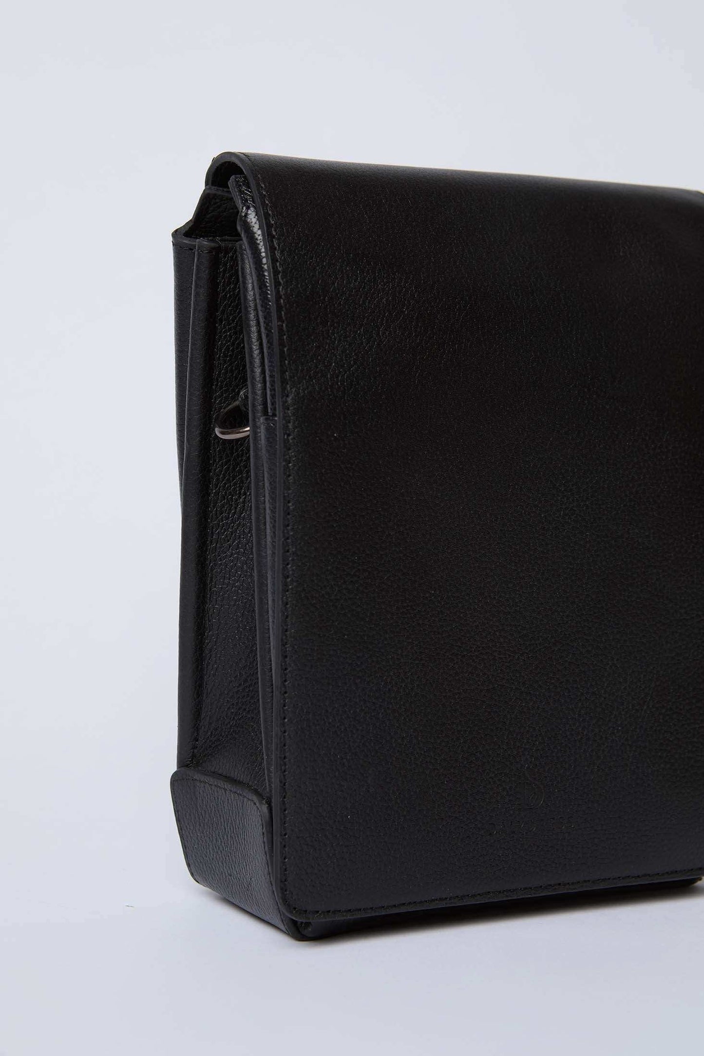 Dalydress black leather crossbody bag with flap, minimalist design on white background