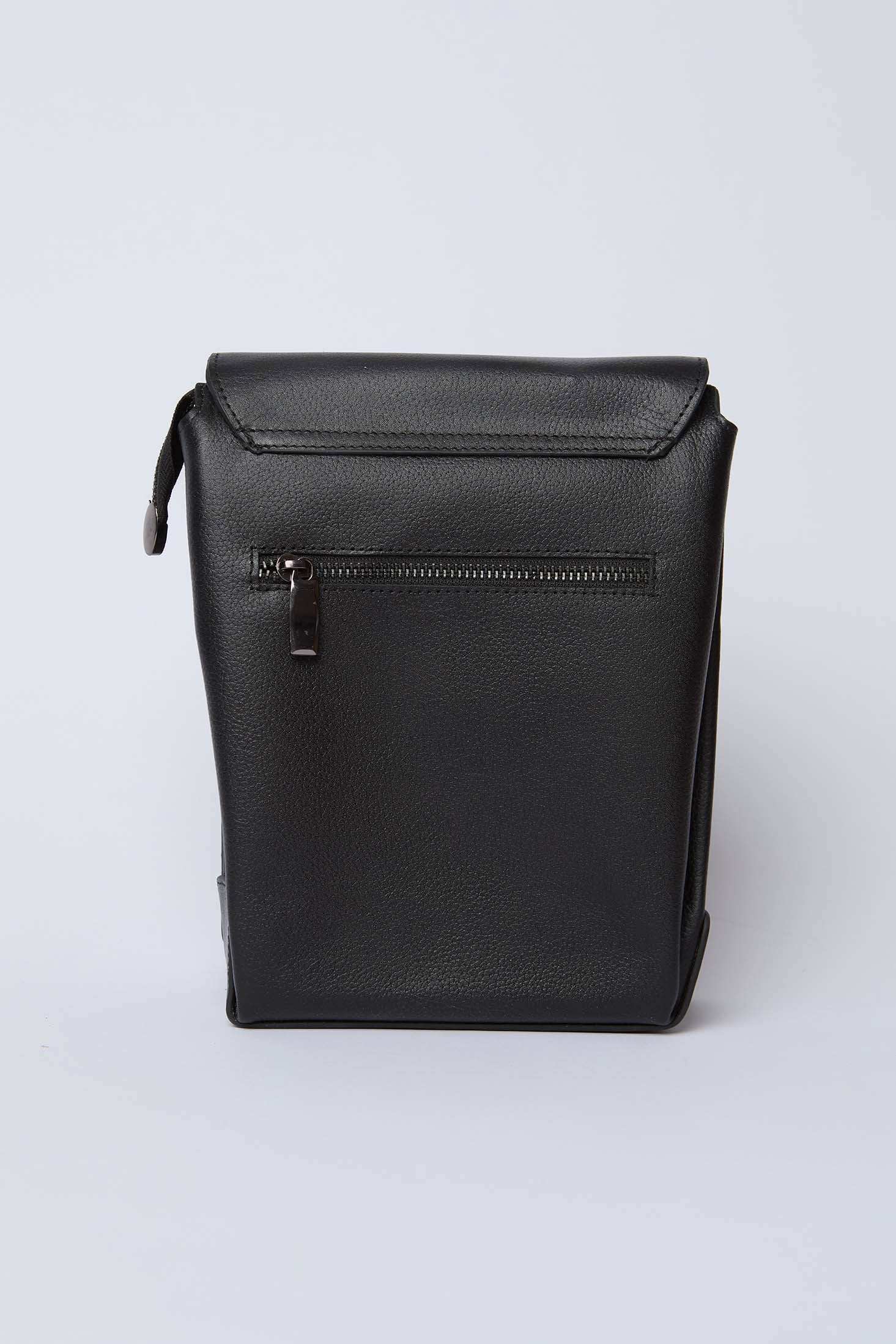 Dalydress black leather sling bag with front zipper pocket on white background