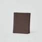 Dalydress brown leather men's wallet with subtle embossed logo on plain background