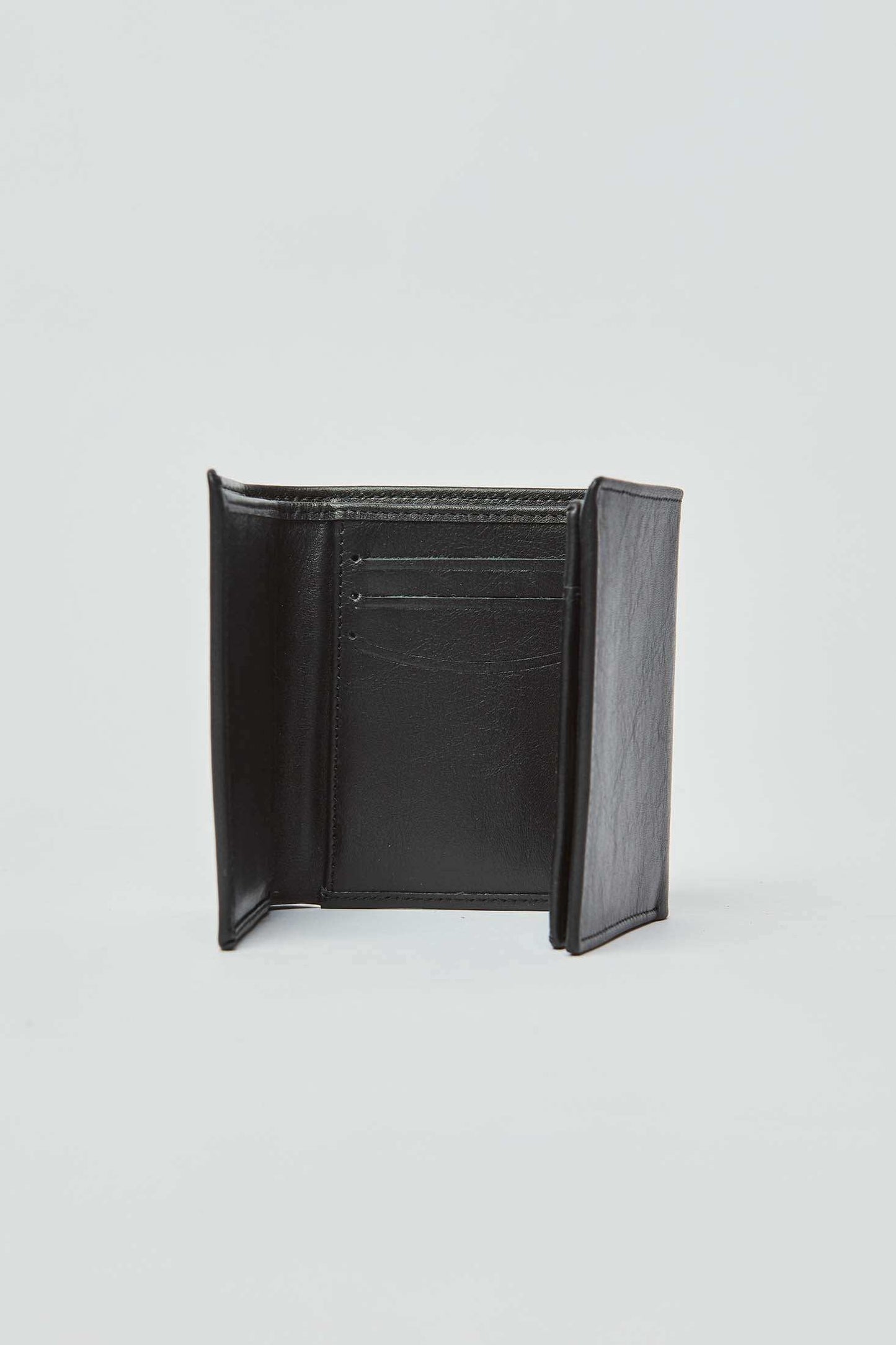 Dalydress men's black leather wallet with card slots, minimalist design, open on white background