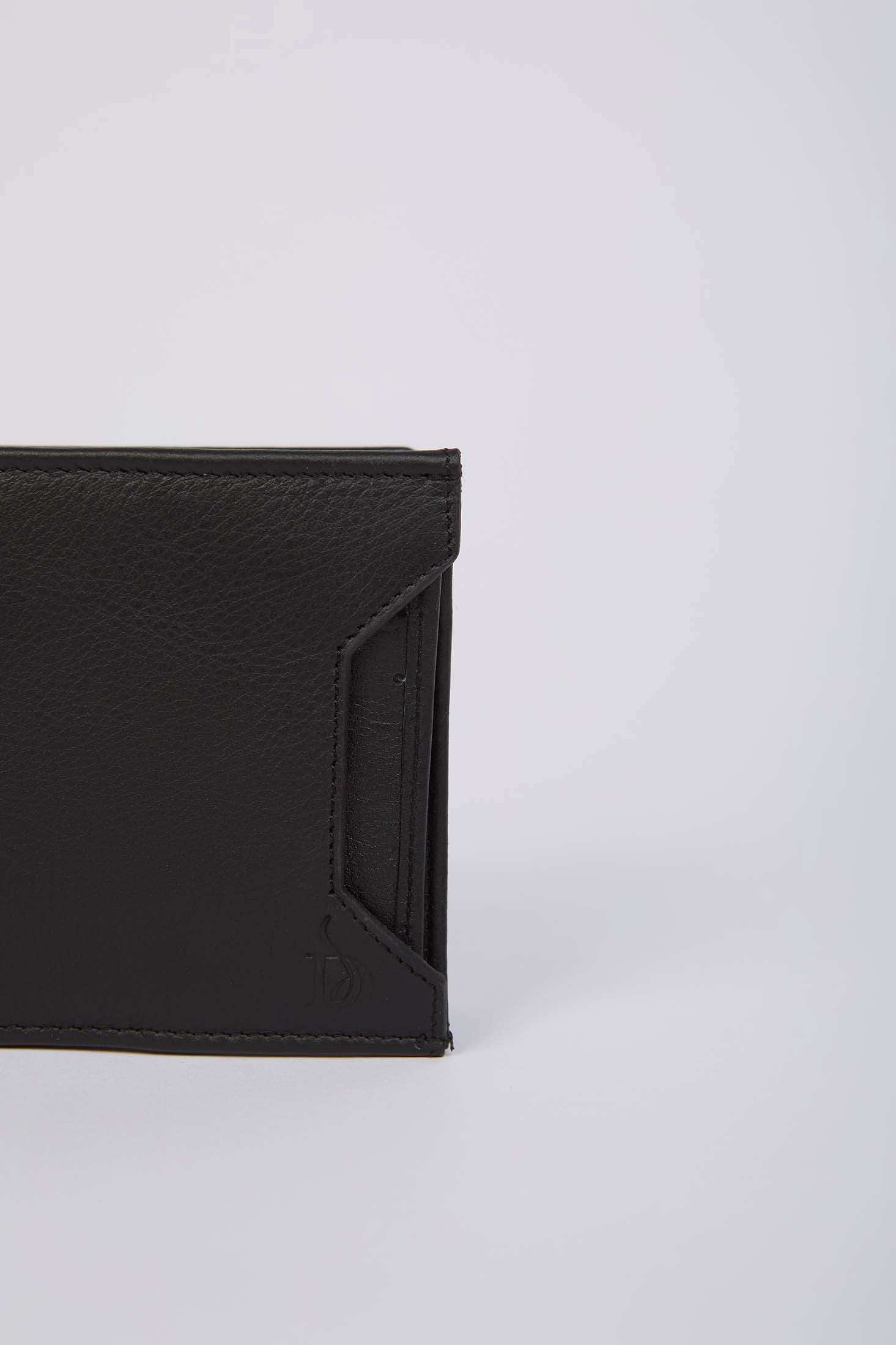 Dalydress black leather men's wallet with textured finish on a light background