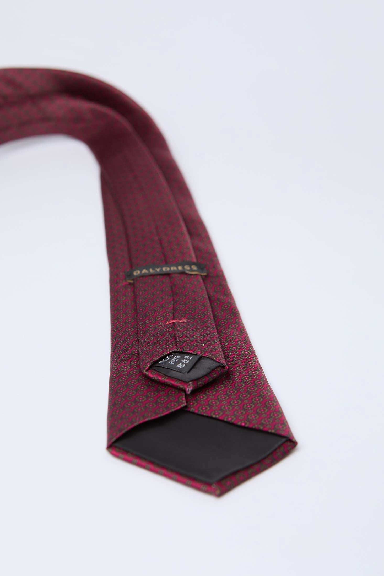Dalydress men's red patterned necktie with logo tag on white background