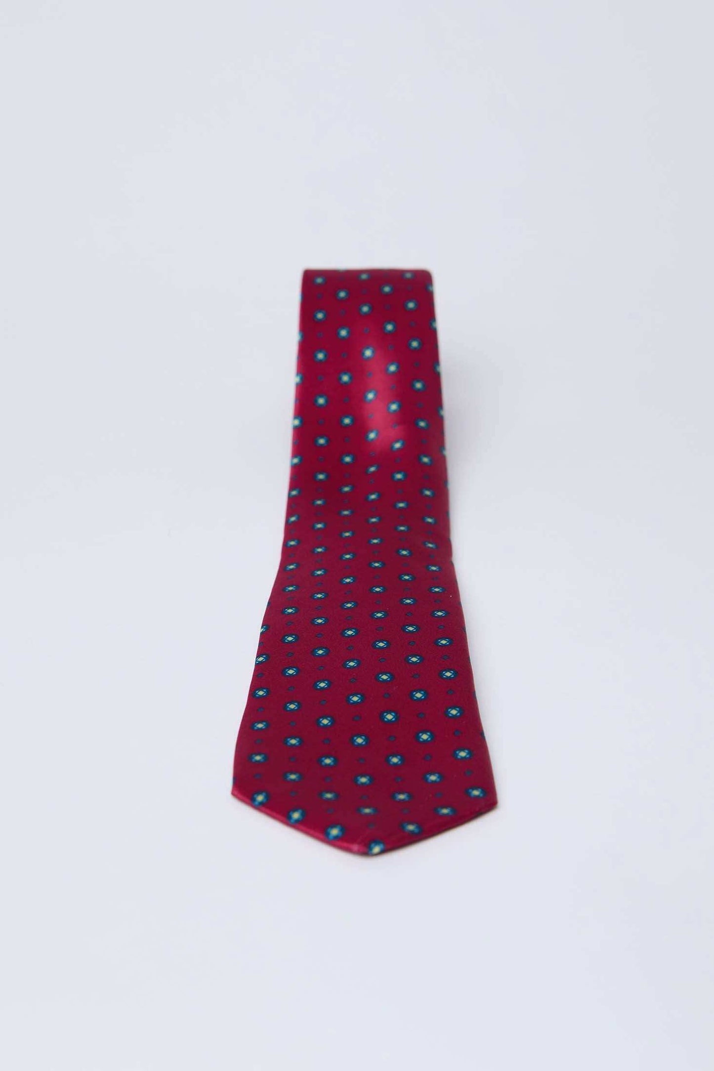 Dalydress men's red tie with blue and yellow geometric pattern on white background