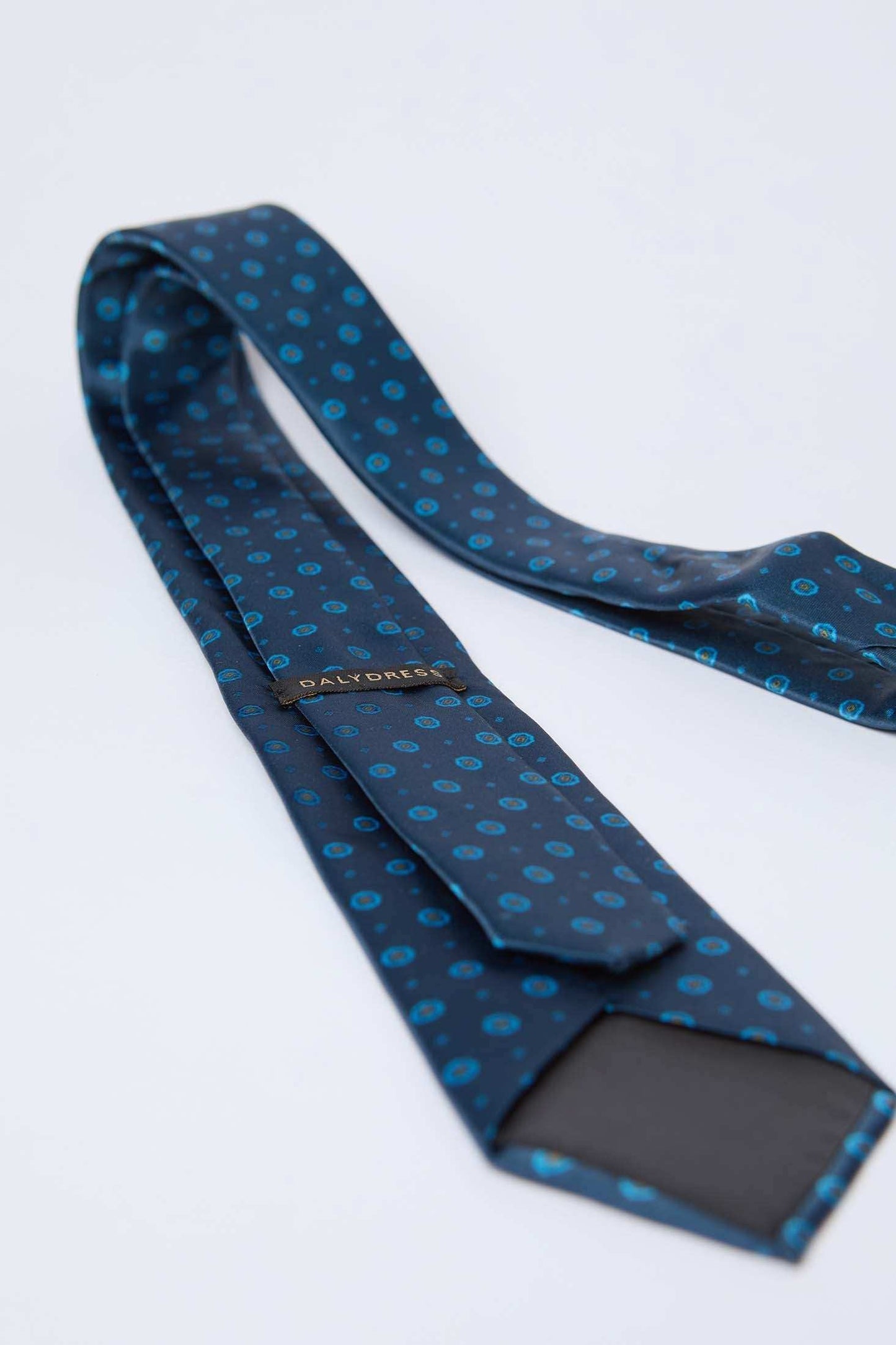 Dalydress blue patterned men's silk tie on white background, Egyptian fashion accessory