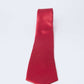 Red Dalydress men's tie with small white polka dots on a plain white background