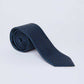 Dalydress men's navy blue patterned tie rolled on a white background