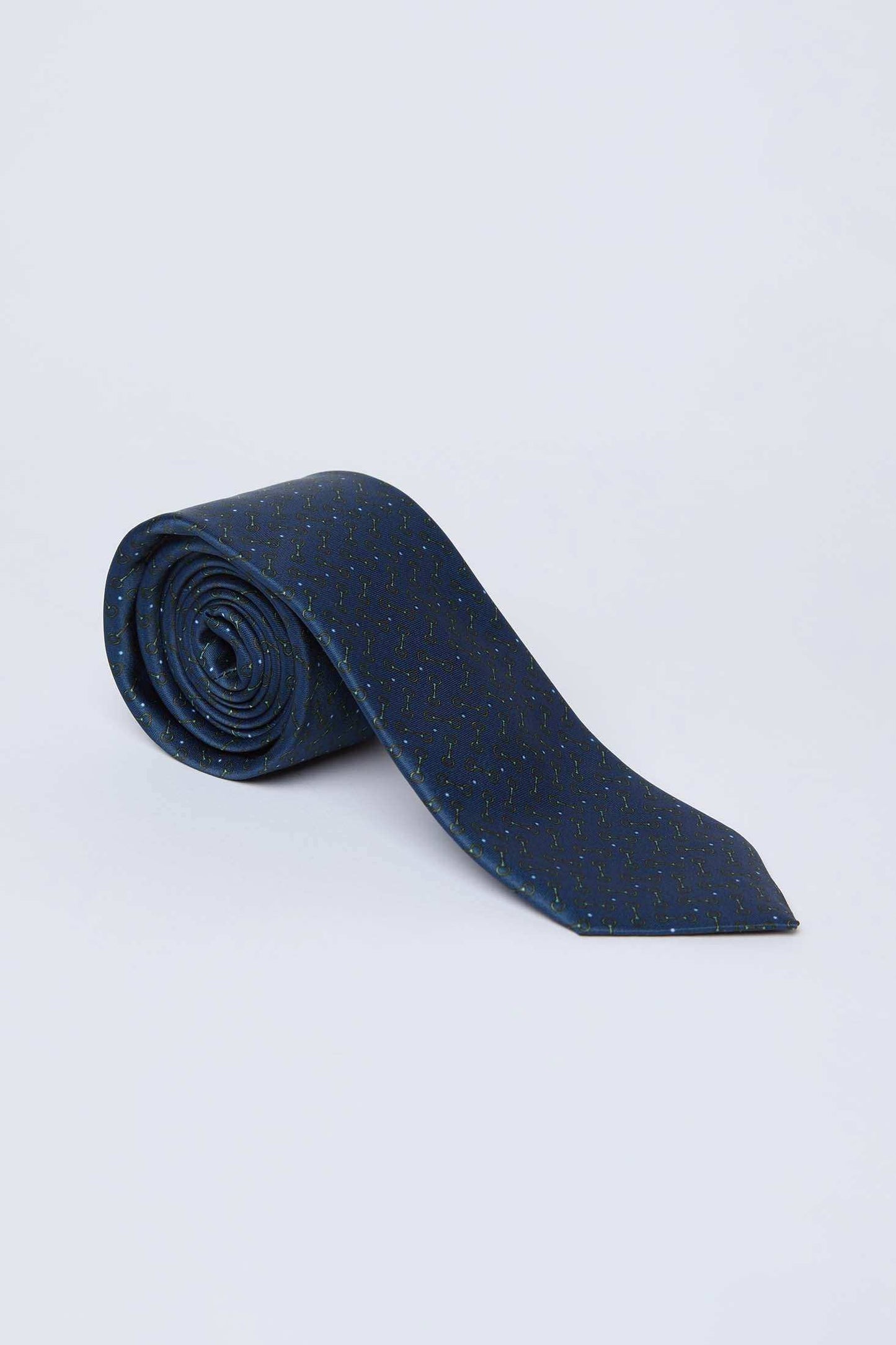 Dalydress men's navy blue patterned tie rolled on a white background