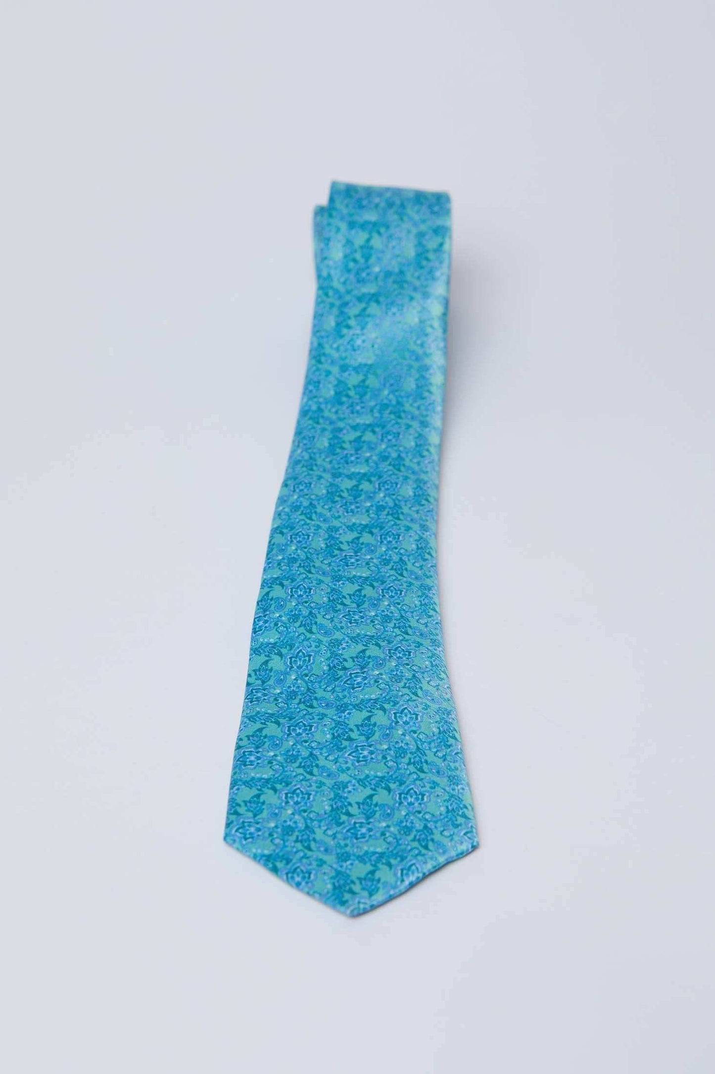 Blue floral patterned men's tie from Dalydress on a white background