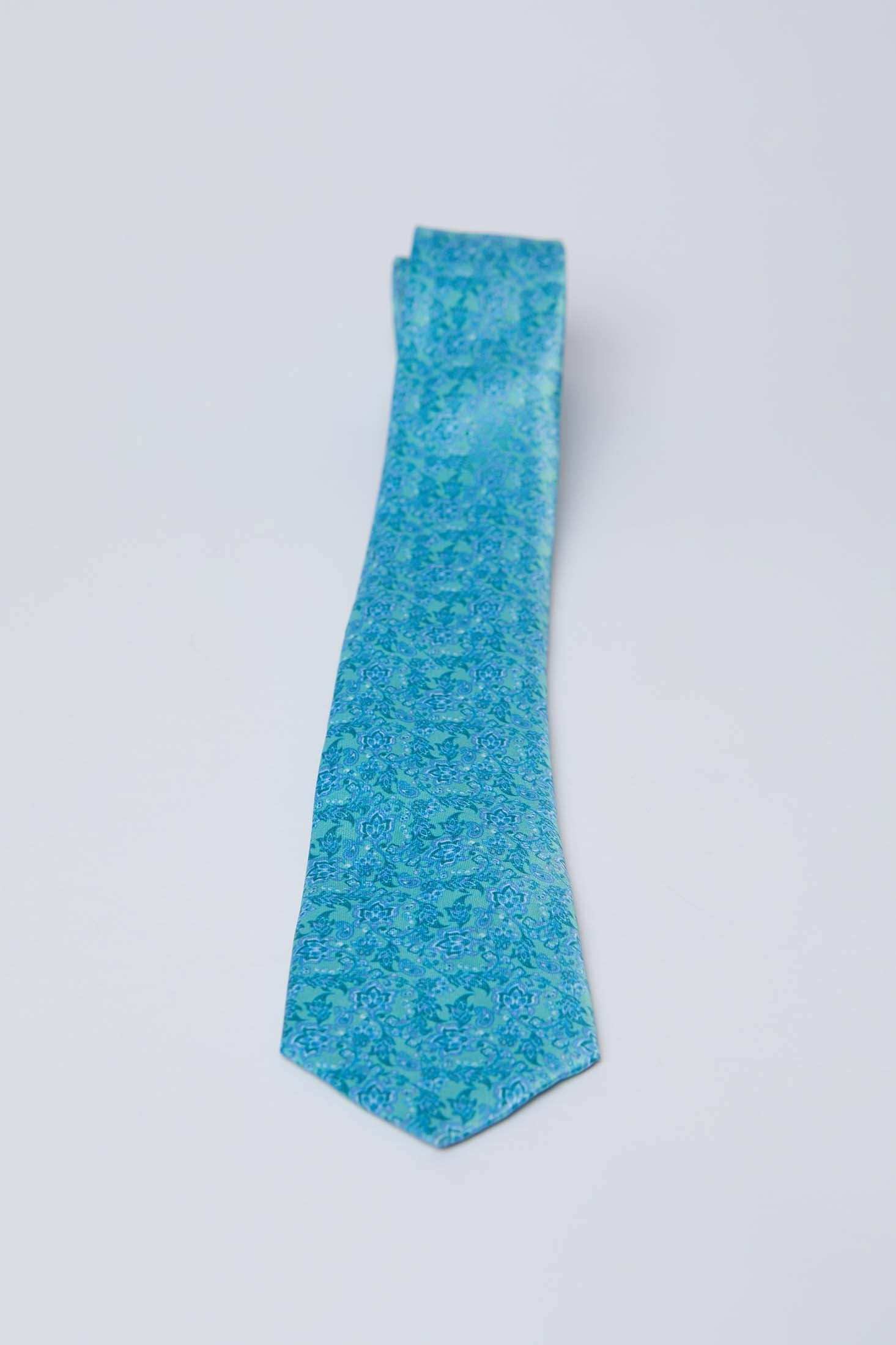 Blue floral patterned men's tie from Dalydress on a white background