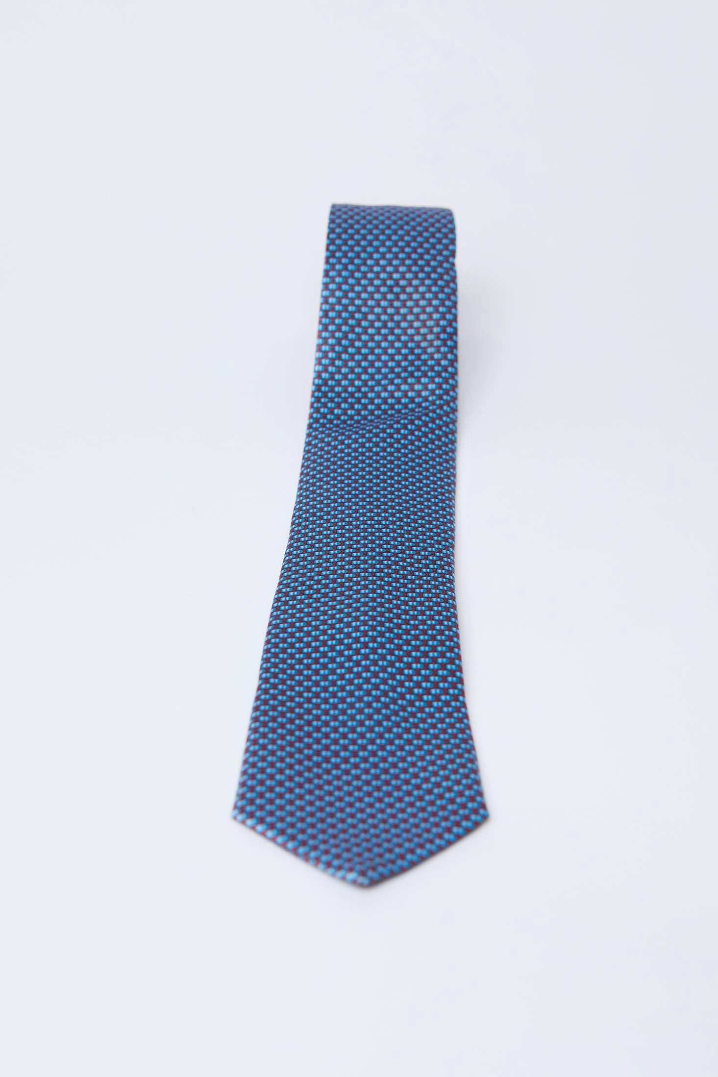 Dalydress men's blue dotted tie on white background, Egyptian fashion accessory