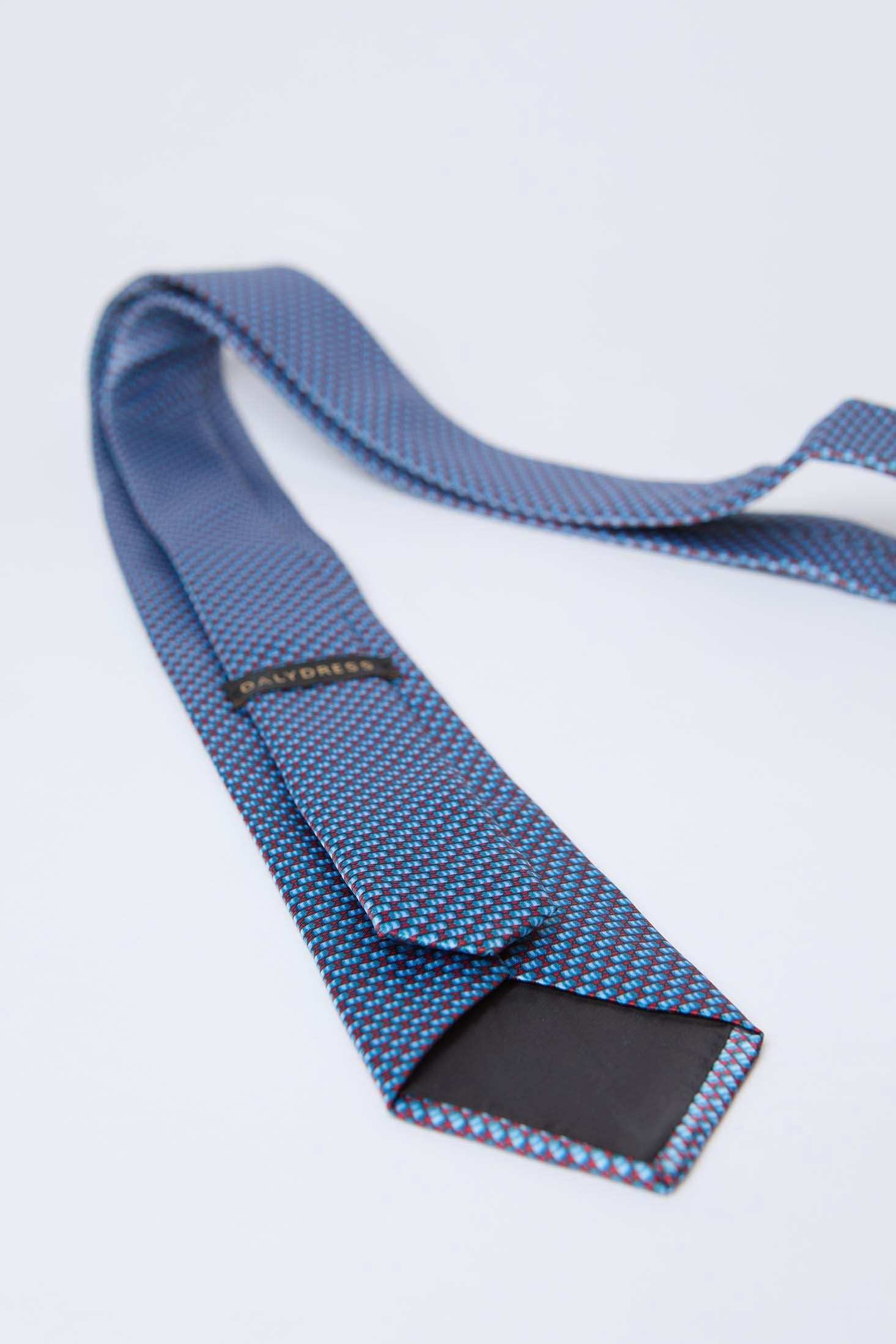 Dalydress blue patterned men's necktie on white background, Egyptian fashion accessory