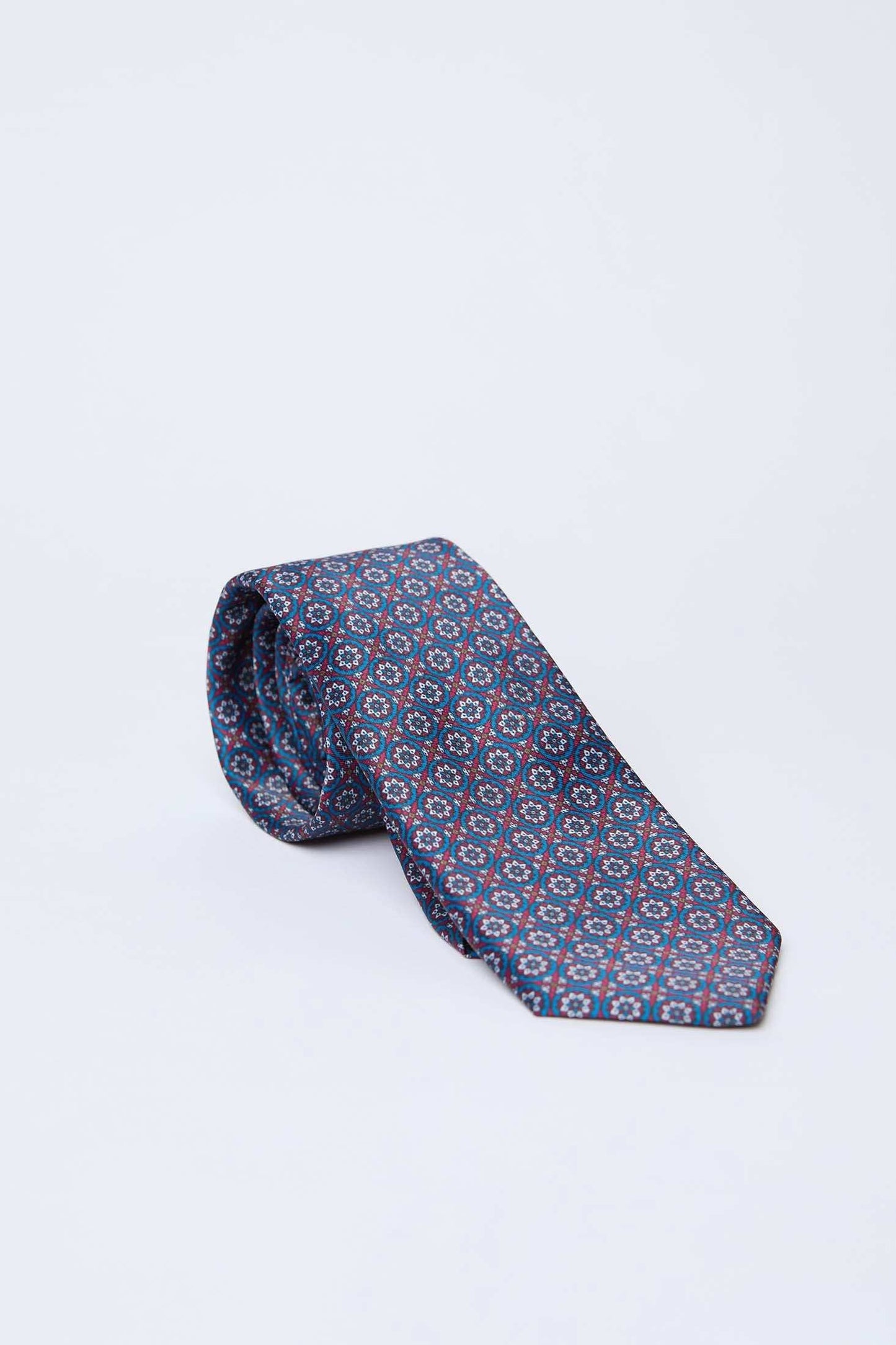 Dalydress patterned blue and red men's tie on white background, elegant Egyptian accessory