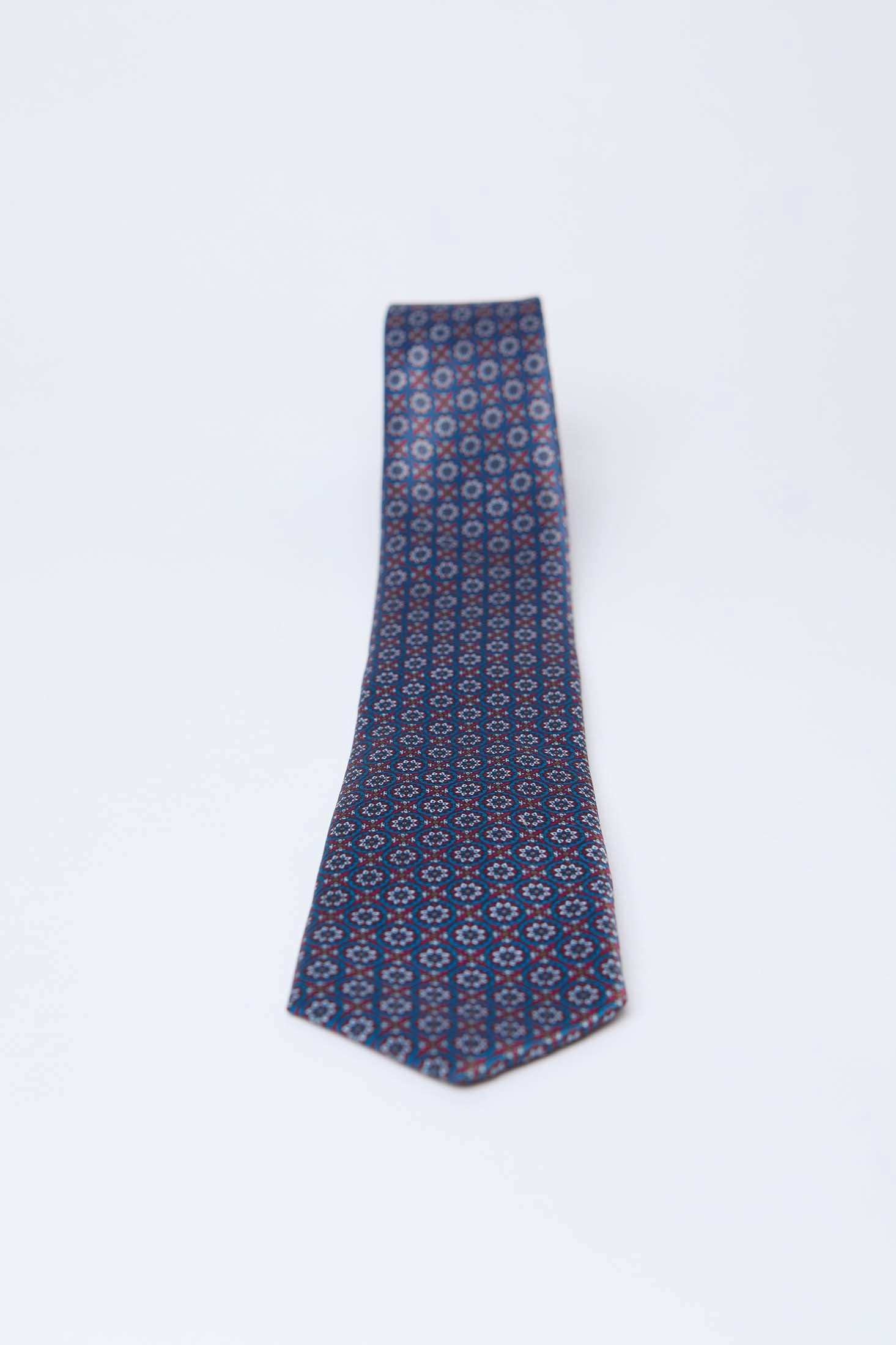 Dalydress men's blue geometric patterned tie on white background, Egyptian fashion accessory