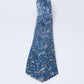 Dalydress blue paisley men’s tie on white background, elegant Egyptian fashion accessory