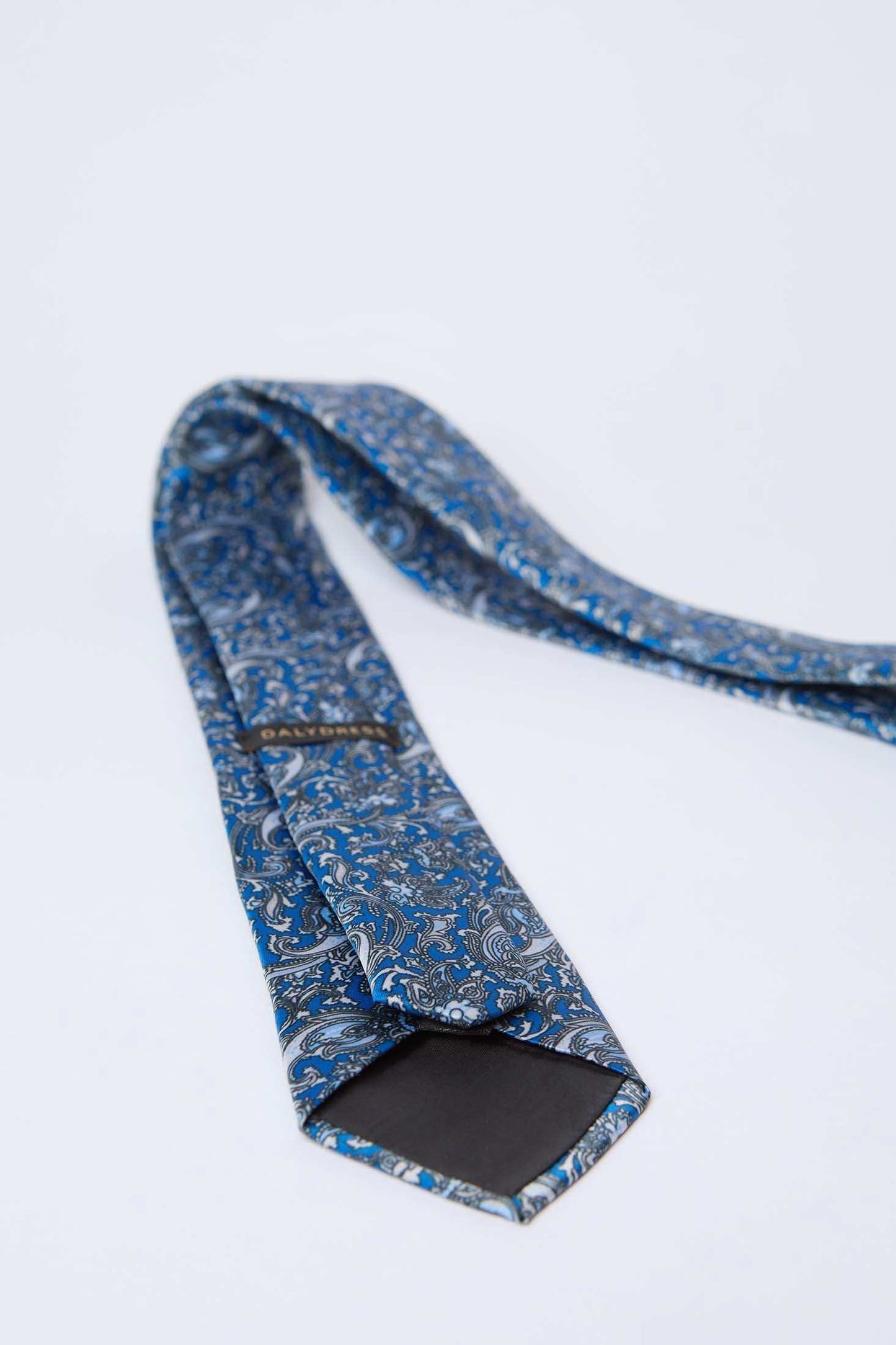 Dalydress men's blue paisley patterned tie on white background, elegant accessory