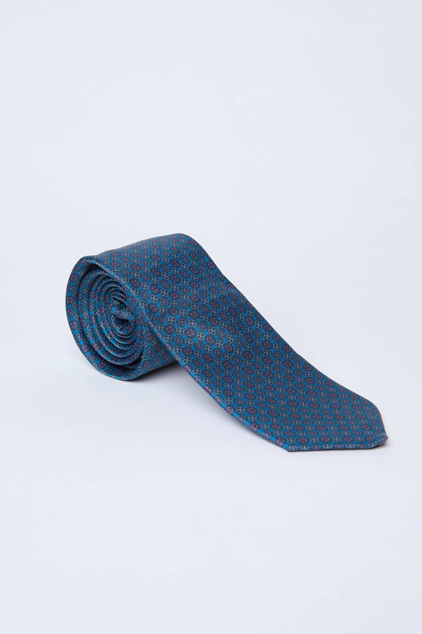 Dalydress men's blue patterned necktie on plain background, sophisticated Egyptian fashion