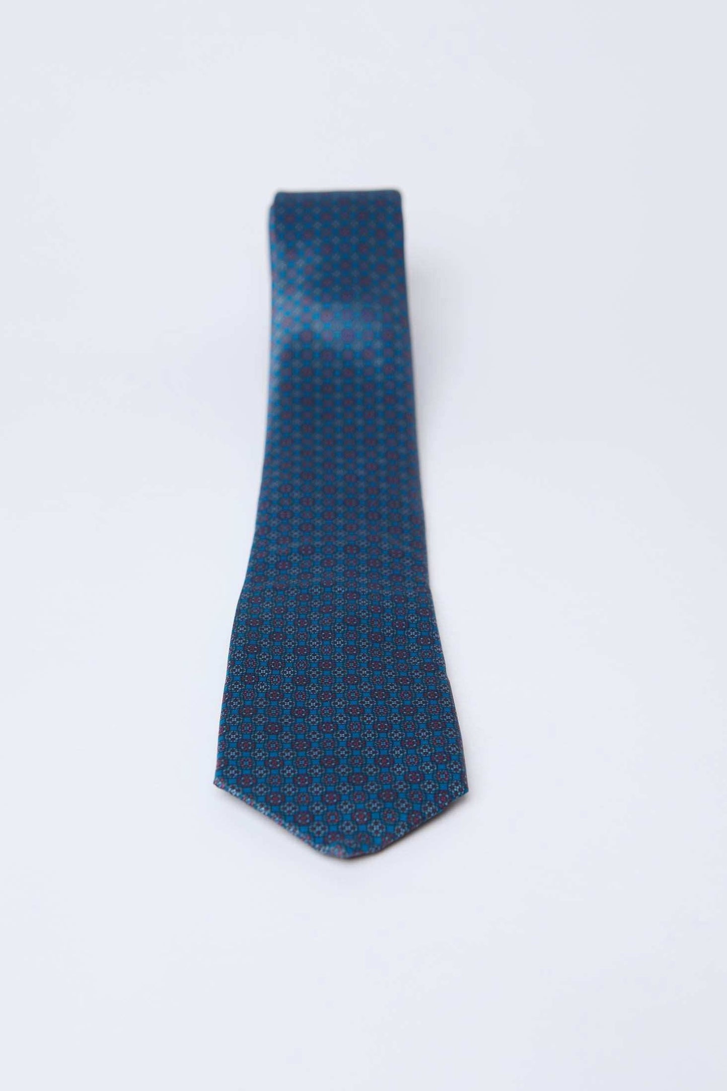 Dalydress blue patterned men's tie on white background, Egyptian fashion accessory