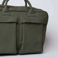 Olive green leather briefcase with dual handles and front pockets on a plain background
