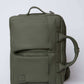 Olive green square backpack with front zipper pockets and top carry handle on white background