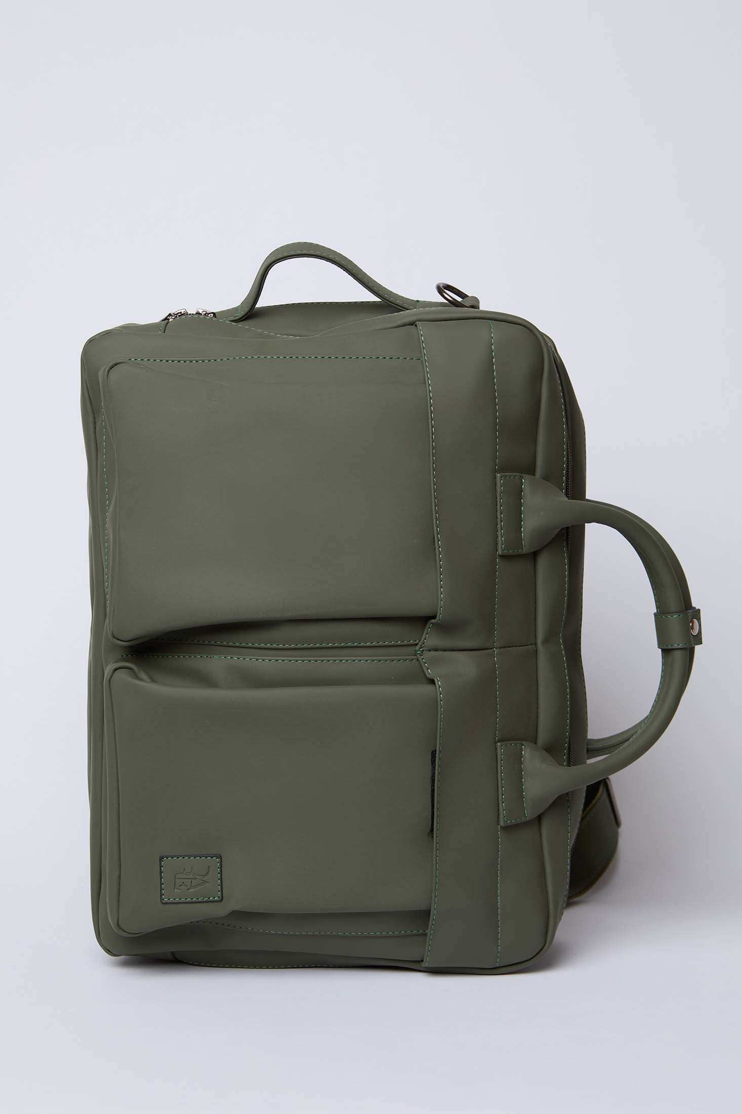 Olive green square backpack with front zipper pockets and top carry handle on white background