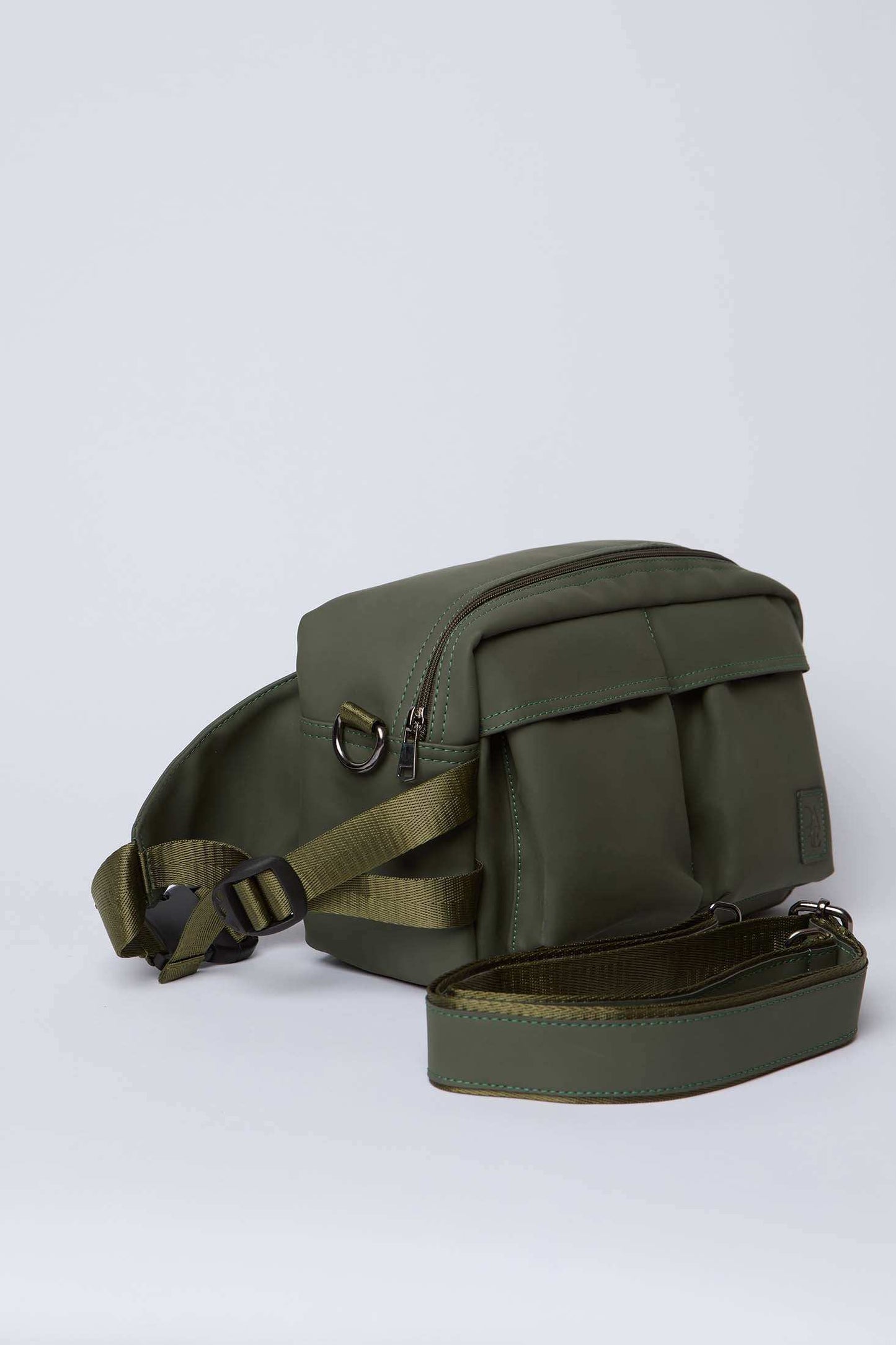 Olive green crossbody bag with two front pockets and adjustable shoulder strap