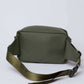 Olive green crossbody bag with adjustable strap and zip closure, minimalist design